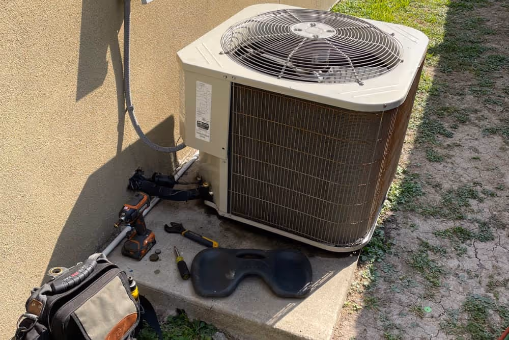 air conditioning unit being repaired in mission tx